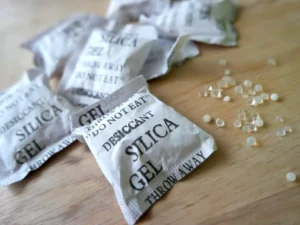 silica gel packets on table surface.